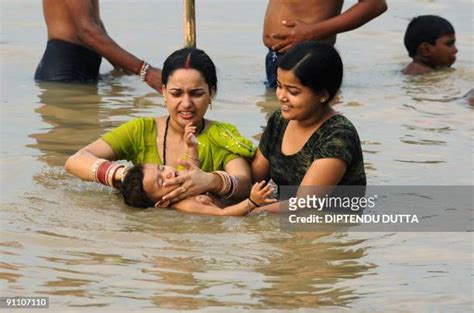 indian aunty bath|1,106 River Bathing Indian Women Stock Photos and High